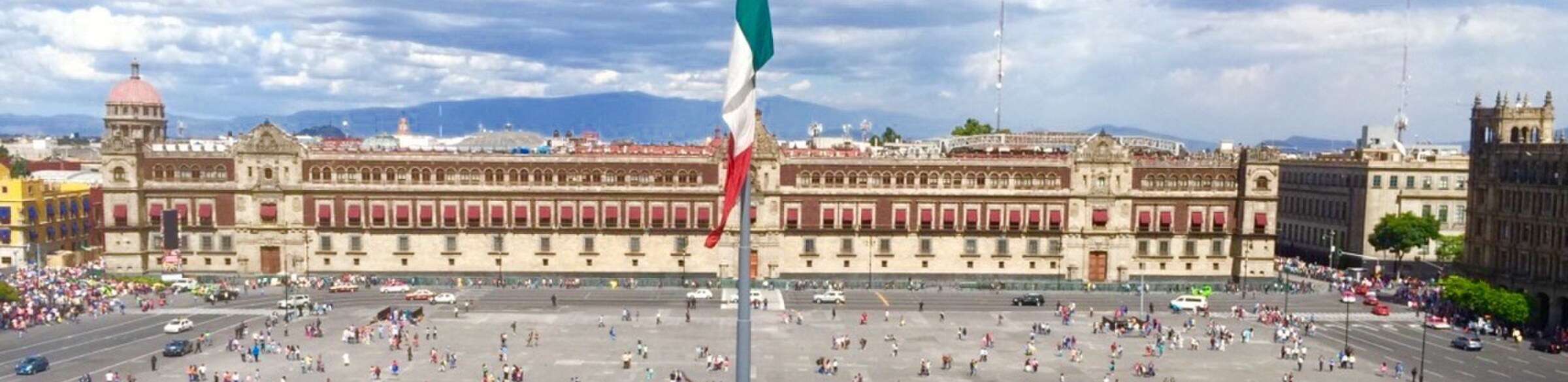 The Zócalo and the National Palace in Mexico City, with the Mexican flag
